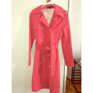 Bright pink trench coat